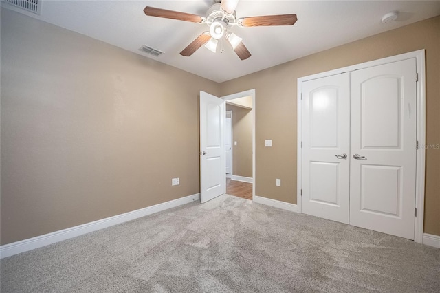 2933 Blackwater Oaks Dr, Mulberry, FL 33860 - unfurnished bedroom featuring visible vents, a closet, carpet flooring, and baseboards