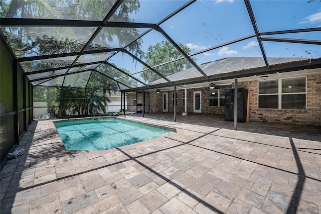 2933 Blackwater Oaks Dr, Mulberry, FL 33860 - pool with a patio, ceiling fan, and glass enclosure
