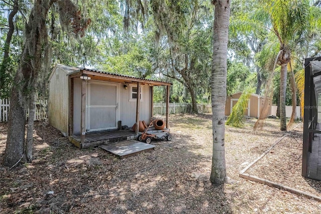 2933 Blackwater Oaks Dr, Mulberry, FL 33860 - view of shed with a fenced backyard