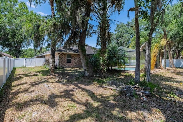 2933 Blackwater Oaks Dr, Mulberry, FL 33860 - view of yard featuring a fenced backyard