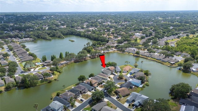 bird's eye view with a water view and a residential view