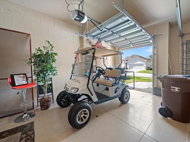 garage featuring a garage door opener