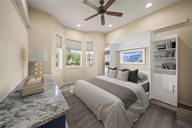 bedroom with recessed lighting, a ceiling fan, and dark wood-style flooring