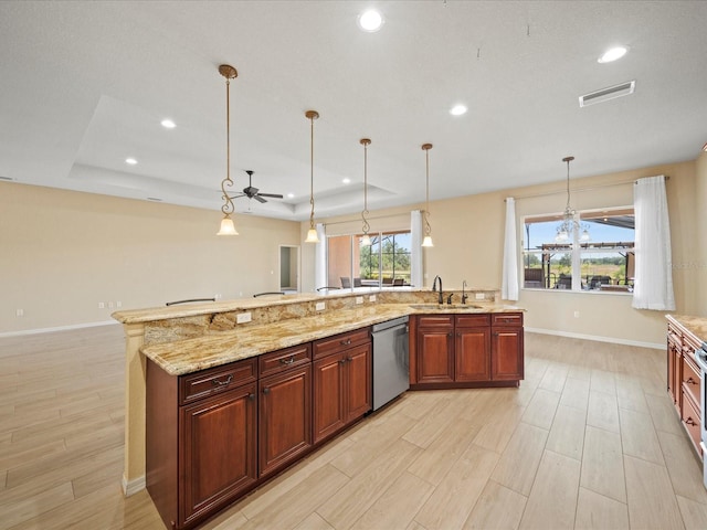 kitchen featuring recessed lighting, visible vents, light wood-style flooring, dishwasher, and ceiling fan with notable chandelier