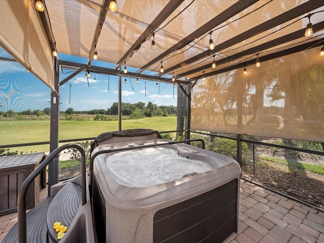 view of patio featuring a pergola and a hot tub