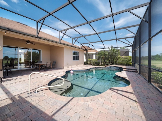 outdoor pool featuring a patio, glass enclosure, outdoor dining area, and a ceiling fan
