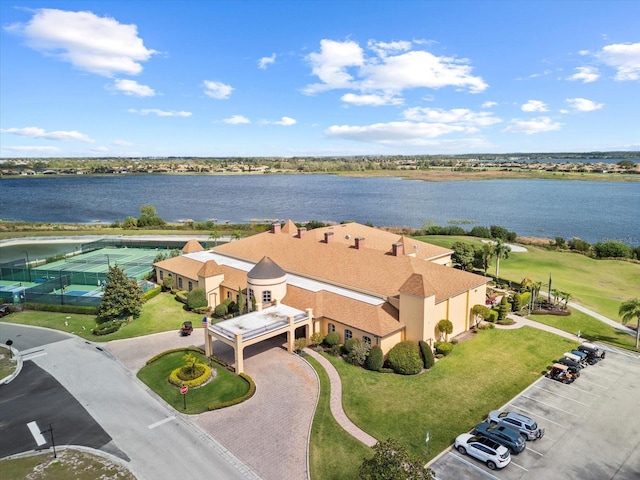 birds eye view of property featuring a water view