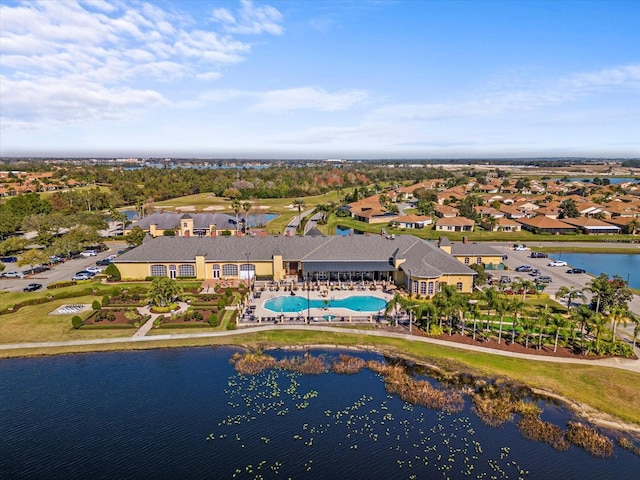 bird's eye view with a water view and a residential view