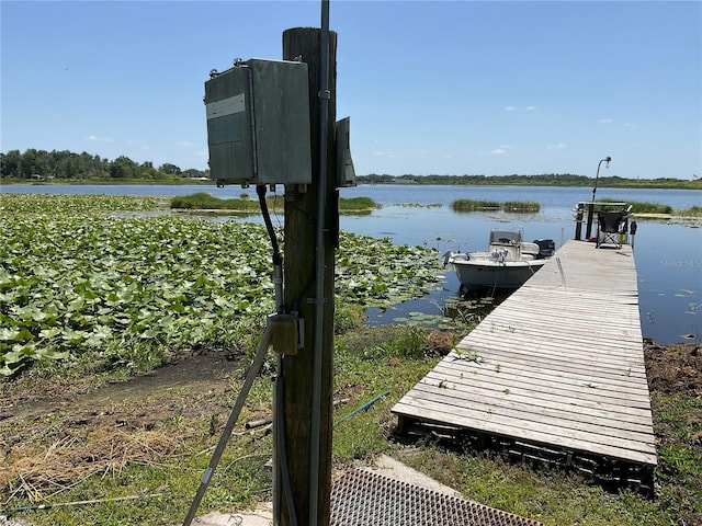 view of dock with a water view
