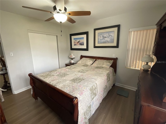 427 Longfellow Blvd, Lakeland, FL 33801 - bedroom featuring baseboards, a closet, and wood finished floors