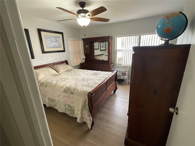427 Longfellow Blvd, Lakeland, FL 33801 - bedroom with light wood-type flooring and a ceiling fan