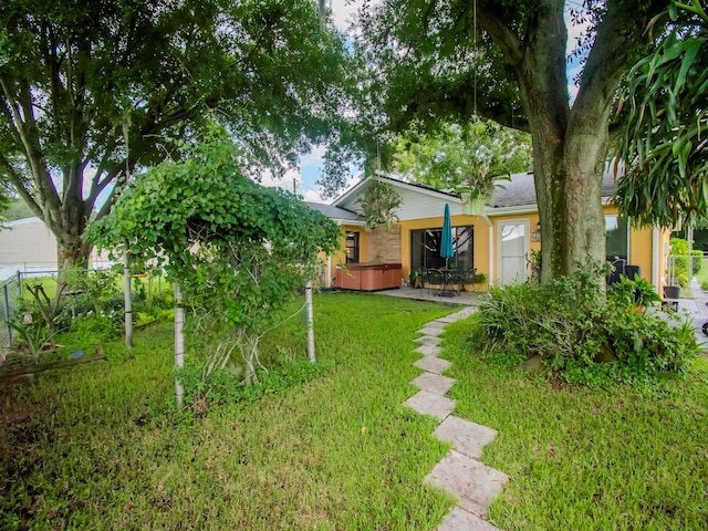 427 Longfellow Blvd, Lakeland, FL 33801 - view of yard featuring a patio and fence