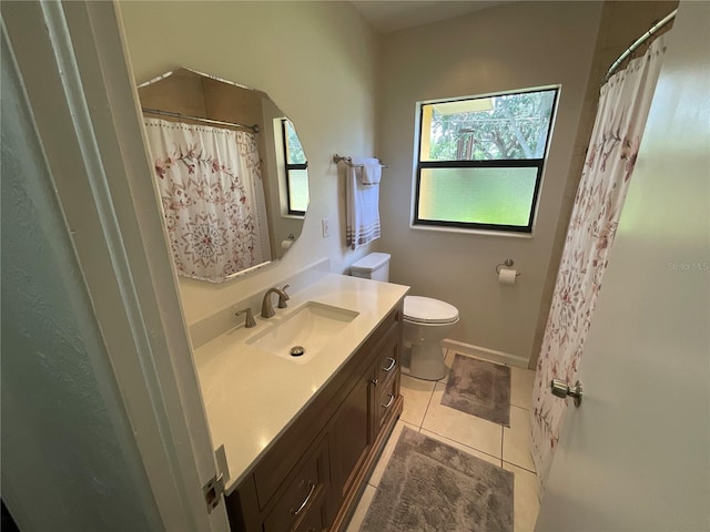 427 Longfellow Blvd, Lakeland, FL 33801 - bathroom featuring vanity, tile patterned flooring, and curtained shower