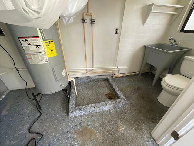 427 Longfellow Blvd, Lakeland, FL 33801 - bathroom featuring electric water heater and toilet