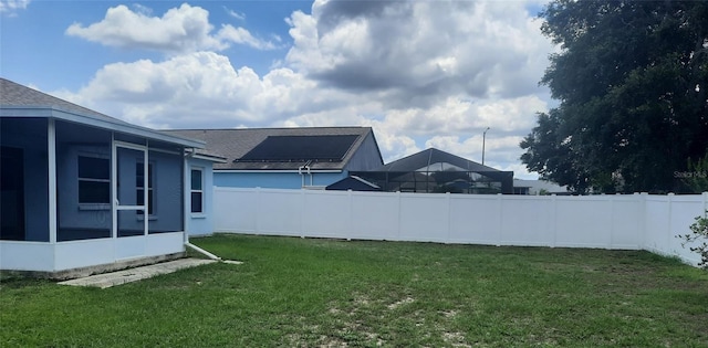 603 Reflections Loop, Winter Haven, FL 33884 - view of yard with a sunroom