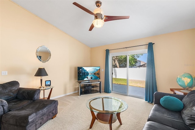 carpeted living room featuring baseboards, ceiling fan, and lofted ceiling