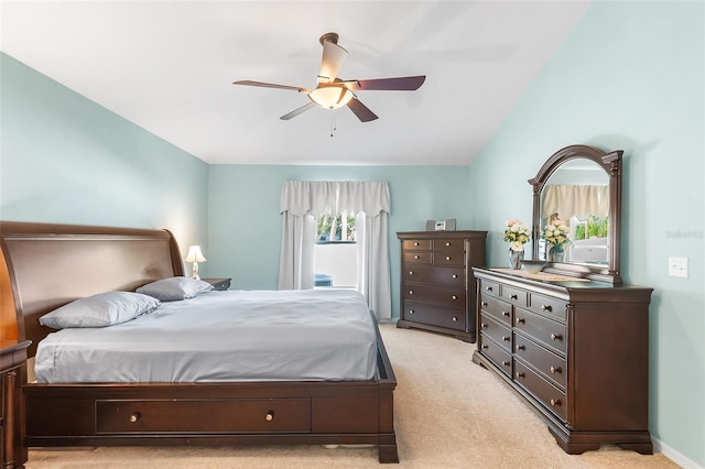 bedroom featuring ceiling fan and light carpet