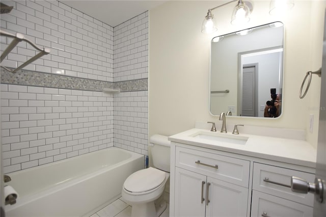 bathroom featuring shower / bathtub combination, toilet, and vanity