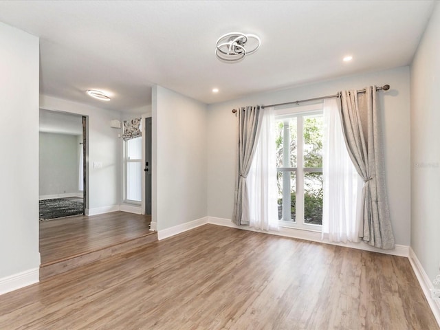 502 Duchess Dr, Lakeland, FL 33803 - empty room featuring recessed lighting, baseboards, and light wood-type flooring