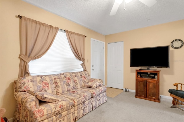 1130 N Lake Parker Ave Unit C321, Lakeland, FL 33805 - living area featuring ceiling fan, carpet, and a textured ceiling