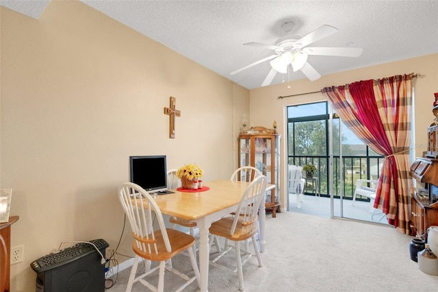 1130 N Lake Parker Ave Unit C321, Lakeland, FL 33805 - dining area featuring carpet floors, a ceiling fan, and a textured ceiling