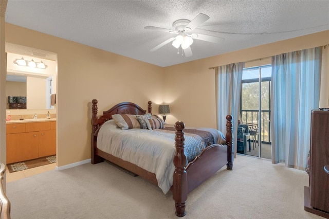 1130 N Lake Parker Ave Unit C321, Lakeland, FL 33805 - bedroom featuring ensuite bathroom, a textured ceiling, light carpet, and access to exterior