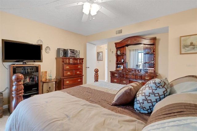 1130 N Lake Parker Ave Unit C321, Lakeland, FL 33805 - bedroom with a ceiling fan, a textured ceiling, and visible vents