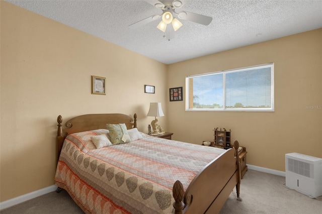 1130 N Lake Parker Ave Unit C321, Lakeland, FL 33805 - carpeted bedroom with baseboards, a ceiling fan, and a textured ceiling