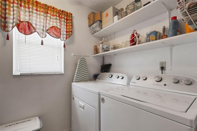 1130 N Lake Parker Ave Unit C321, Lakeland, FL 33805 - washroom featuring independent washer and dryer, a textured ceiling, and laundry area