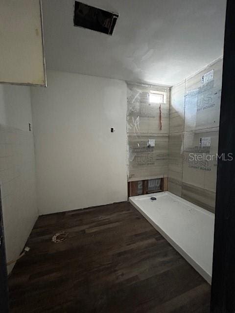 bathroom featuring wood finished floors
