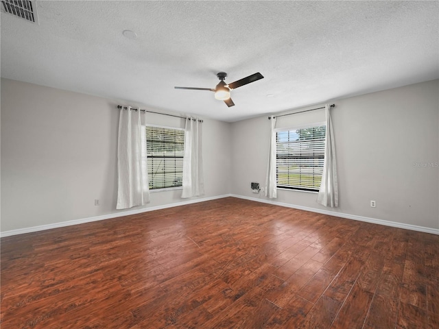3002 Helms Dr, Auburndale, FL 33823 - unfurnished room with a ceiling fan, visible vents, plenty of natural light, and wood finished floors