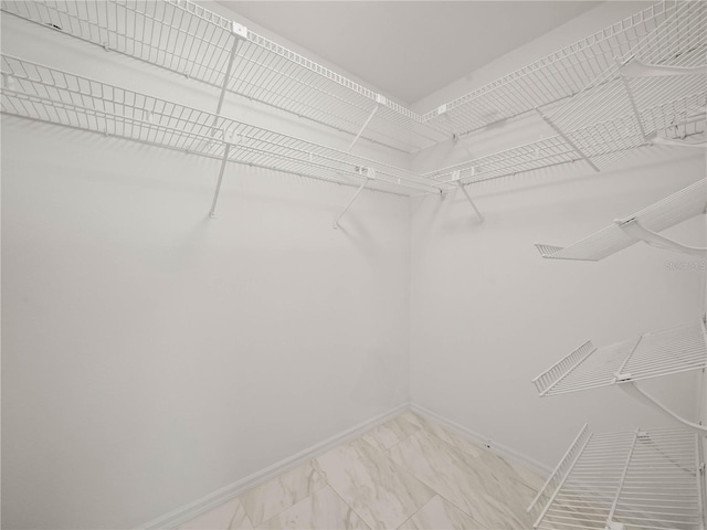 3002 Helms Dr, Auburndale, FL 33823 - walk in closet with marble finish floor