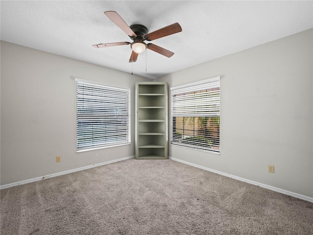 3002 Helms Dr, Auburndale, FL 33823 - unfurnished room featuring carpet flooring, a ceiling fan, and baseboards