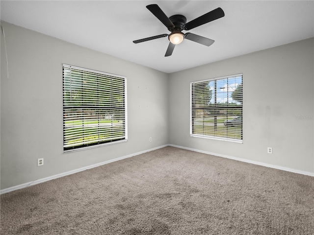 3002 Helms Dr, Auburndale, FL 33823 - carpeted empty room featuring a ceiling fan and baseboards