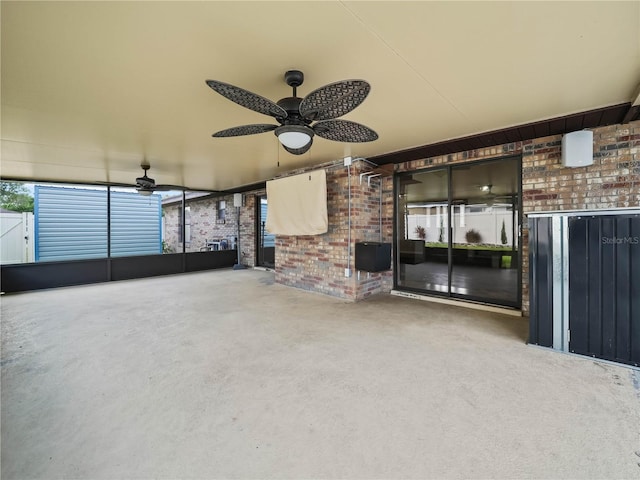 3002 Helms Dr, Auburndale, FL 33823 - unfurnished living room with ceiling fan, brick wall, and a wealth of natural light
