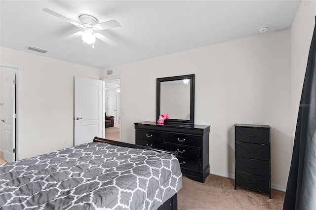 11 W Bay St, Davenport, FL 33837 - bedroom featuring light carpet, ceiling fan, and baseboards