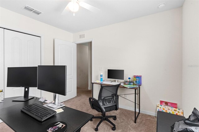 11 W Bay St, Davenport, FL 33837 - home office featuring light carpet, ceiling fan, and baseboards