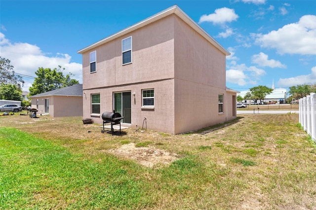 11 W Bay St, Davenport, FL 33837 - back of property with stucco siding