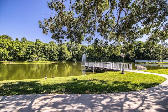 4976 Pleasant Hollow Trl, Lakeland, FL 33811 - view of community featuring a water view and a yard