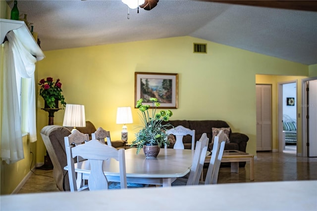 4976 Pleasant Hollow Trl, Lakeland, FL 33811 - dining area featuring ceiling fan, vaulted ceiling, and visible vents