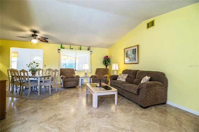 4976 Pleasant Hollow Trl, Lakeland, FL 33811 - living area featuring baseboards, ceiling fan, lofted ceiling, and visible vents