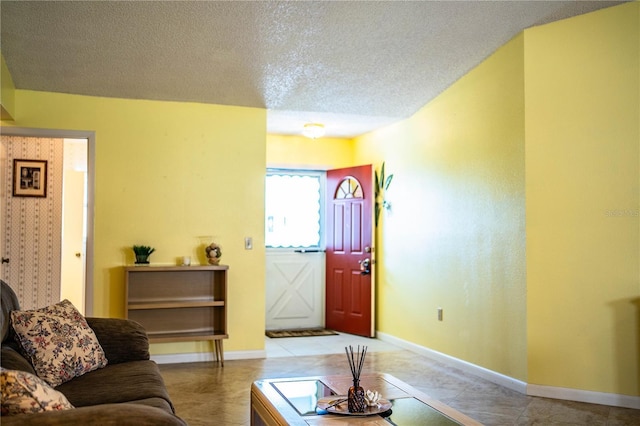 4976 Pleasant Hollow Trl, Lakeland, FL 33811 - living area featuring baseboards and a textured ceiling