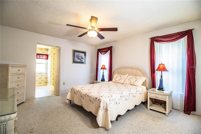 4976 Pleasant Hollow Trl, Lakeland, FL 33811 - bedroom with baseboards, ceiling fan, and carpet