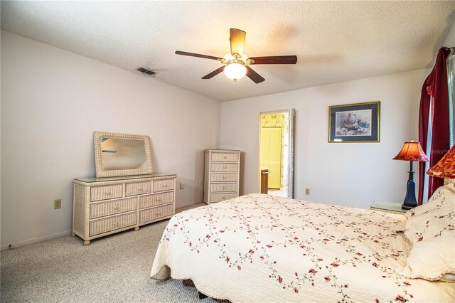 4976 Pleasant Hollow Trl, Lakeland, FL 33811 - carpeted bedroom featuring visible vents, baseboards, ceiling fan, and ensuite bathroom