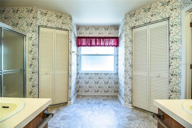 4976 Pleasant Hollow Trl, Lakeland, FL 33811 - full bath featuring vanity, tile patterned floors, wallpapered walls, baseboards, and a closet