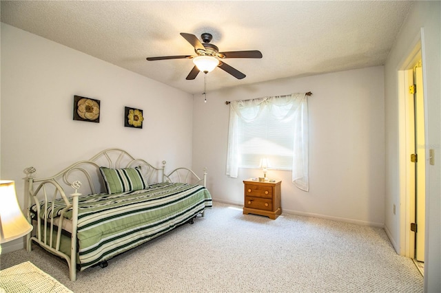 4976 Pleasant Hollow Trl, Lakeland, FL 33811 - carpeted bedroom featuring baseboards, a ceiling fan, and a textured ceiling