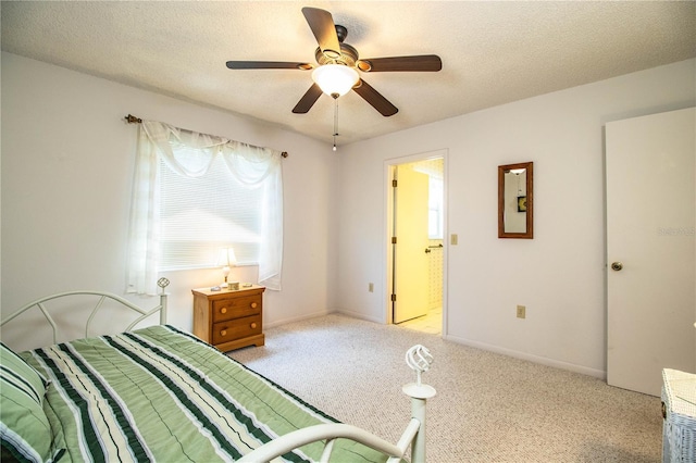 4976 Pleasant Hollow Trl, Lakeland, FL 33811 - carpeted bedroom with a ceiling fan, a textured ceiling, and baseboards