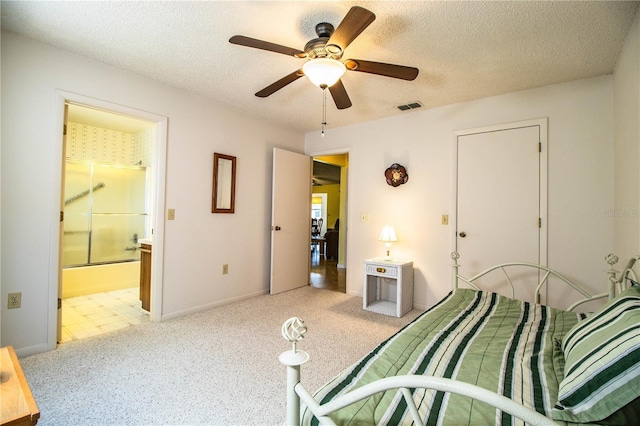 4976 Pleasant Hollow Trl, Lakeland, FL 33811 - carpeted bedroom featuring a textured ceiling, ceiling fan, connected bathroom, and visible vents