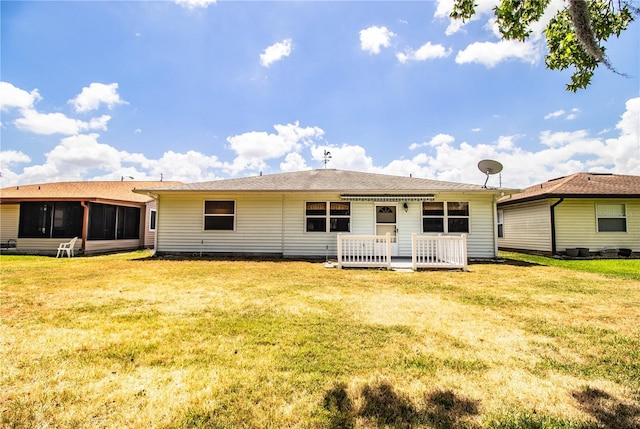 4976 Pleasant Hollow Trl, Lakeland, FL 33811 - back of house with a lawn