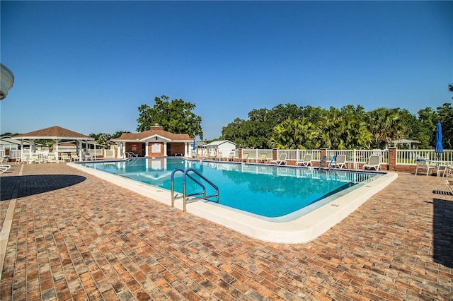 4976 Pleasant Hollow Trl, Lakeland, FL 33811 - pool featuring fence, a gazebo, and a patio area